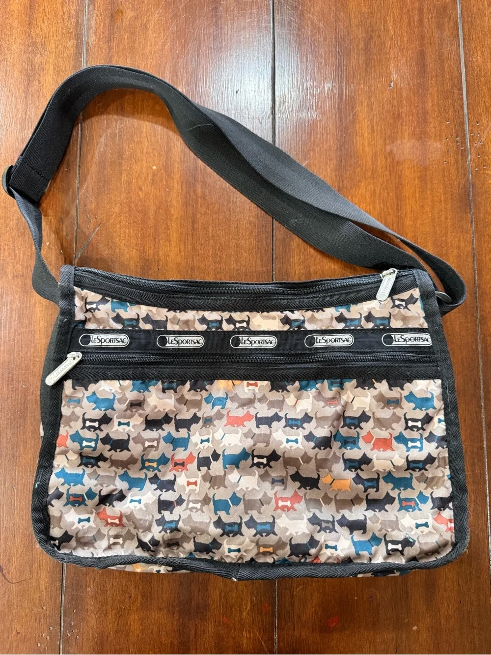 LeSportsac Multi-Dog Print Crossbody in Beige, Blue, Black & Red Accents